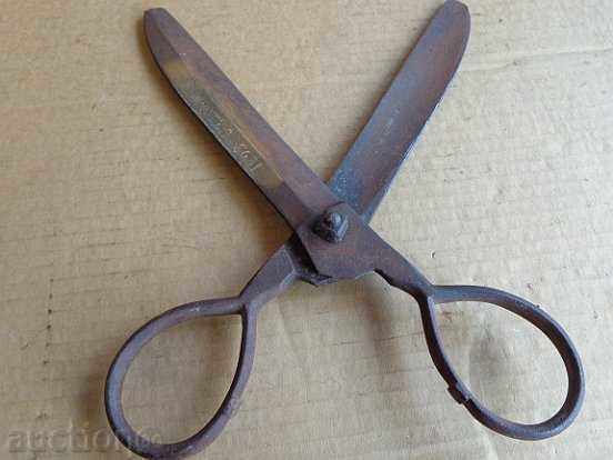 Delivery of Old hand-forged abadge scissors