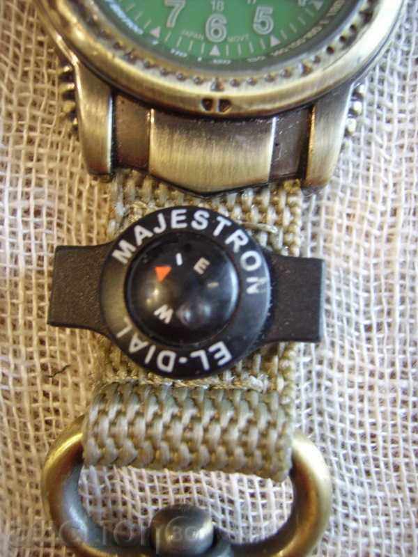 Auction I sell a watch with a keychain and a compass Auction I sell a watch with a keychain and a compass