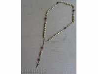 Necklace from mother of pearl and amber from the grave, cross, rosary
