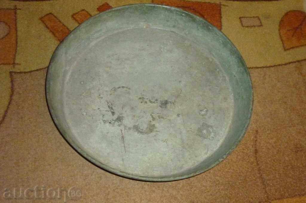 An old tray, a copper pot, a baker, a pan, a kettle, a hibiscus