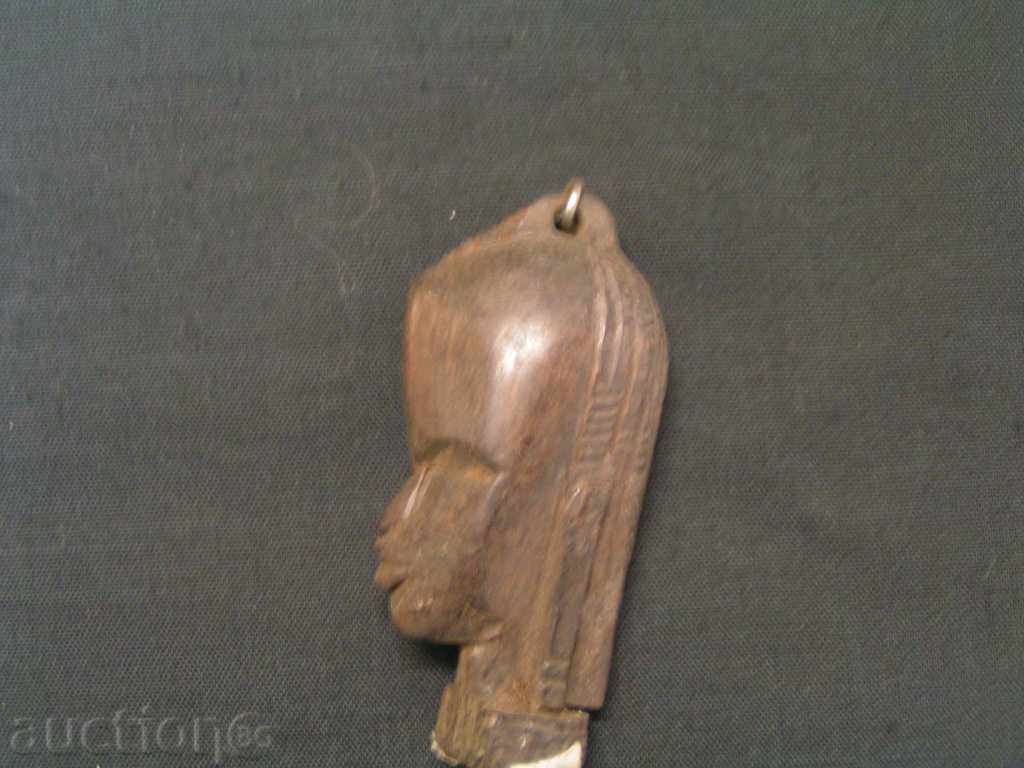 Африкански амулет на женска глава с цена 8.00 лв. | € 4.09