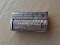 Old gasoline Austrian lighter