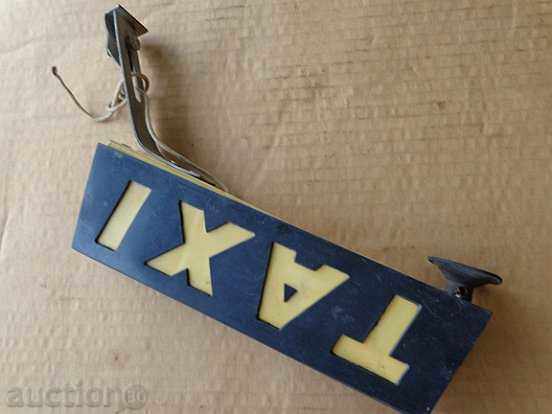 An old plastic plaque of a co-op taxi - 5 An old plastic plaque of a co-op taxi - 5