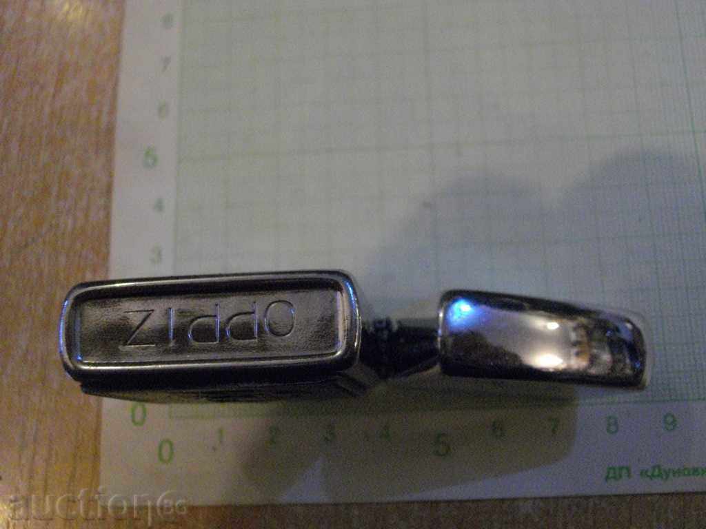 Auction Gasoline lighter with embossed image Auction Gasoline lighter with embossed image