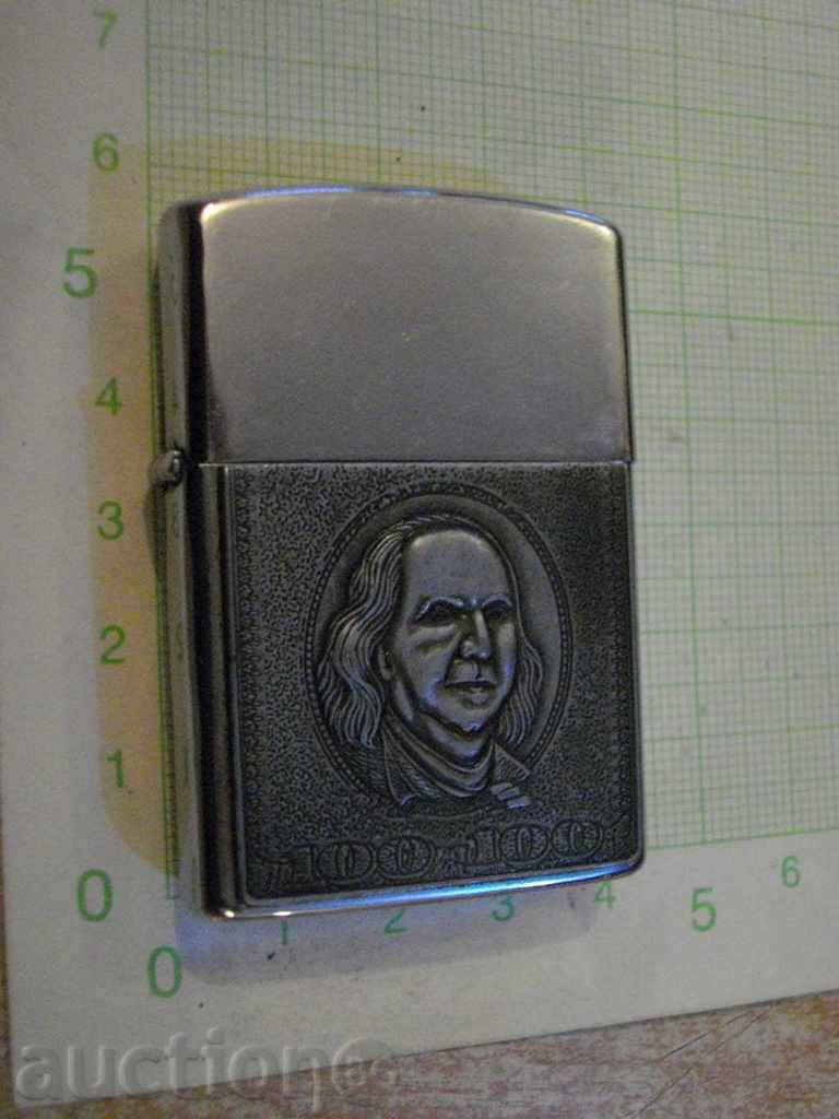 Gasoline lighter with embossed image
