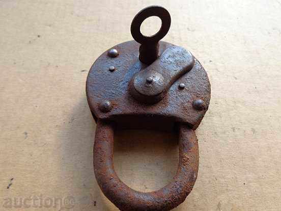 Auction An old padlock, a catan, a coat, a latch, a lock Auction An old padlock, a catan, a coat, a latch, a lock