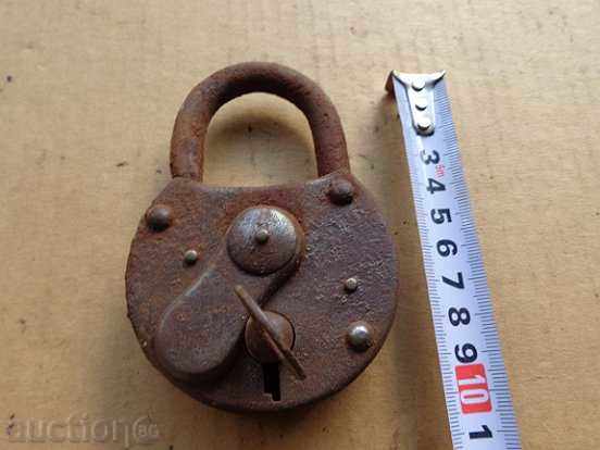 Delivery of An old padlock, a catan, a coat, a latch, a lock Delivery of An old padlock, a catan, a coat, a latch, a lock