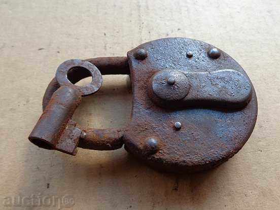 An old padlock, a catan, a coat, a latch, a lock - 6 An old padlock, a catan, a coat, a latch, a lock - 6