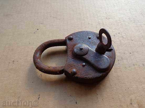 An old padlock, a catan, a coat, a latch, a lock - 7 An old padlock, a catan, a coat, a latch, a lock - 7