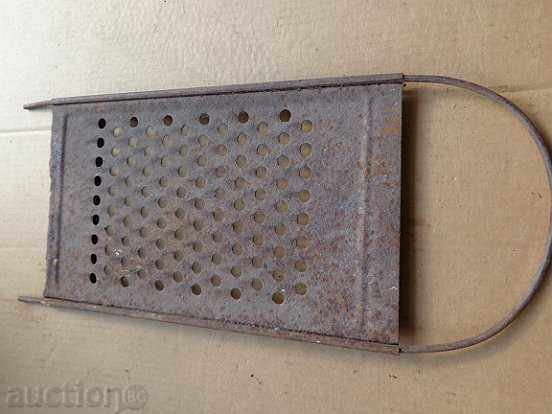 Delivery of Old grater, kitchen tool