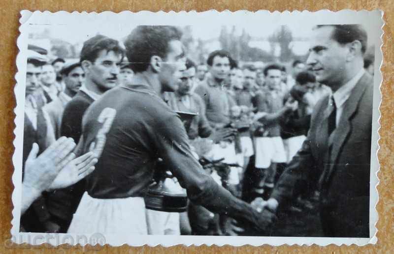 Old football photo, some kind of award