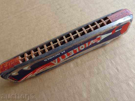 Delivery of Old German harmonica, a musical instrument Hochner