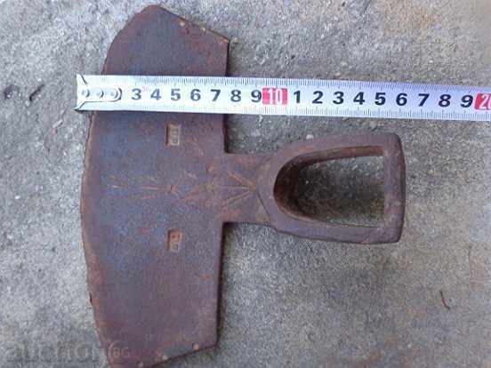 Auction  Mop, an old wrought iron tool, a chap, an agricultural instrument