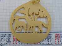 Силуетен медальон от слонова кост