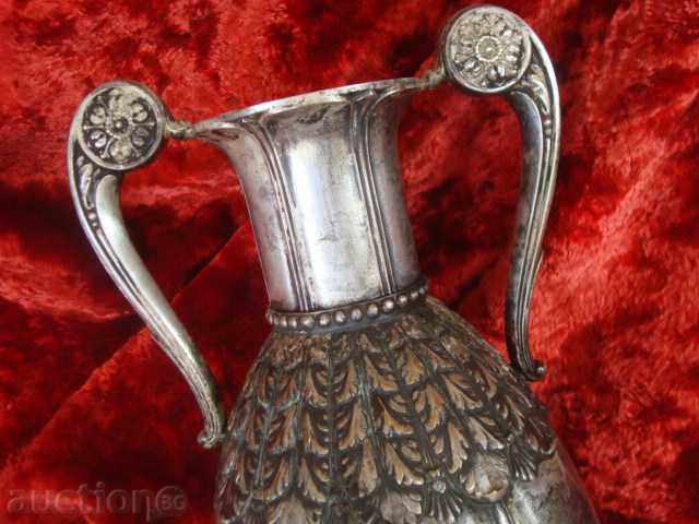 Amphora, VAZA with 2 handles, heavy white metal, bottom with brand. with price 129.95 BGN | € 66.44 Amphora, VAZA with 2 handles, heavy white metal, bottom with brand. with price 129.95 BGN | € 66.44