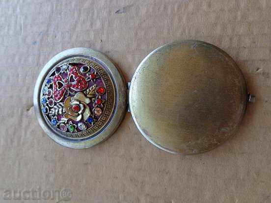 Auction An old powder, a stone mirror, a jewel Auction An old powder, a stone mirror, a jewel