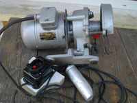 An electric motor with a sewing machine machine working in the USSR