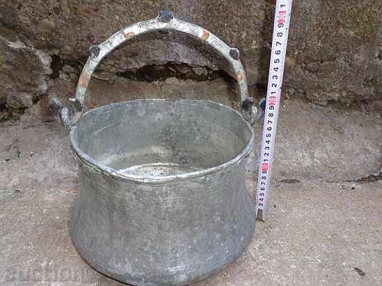 An old copper pot, a tin boiler, a baker, a spoon with price 125.00 BGN | € 63.91 An old copper pot, a tin boiler, a baker, a spoon with price 125.00 BGN | € 63.91