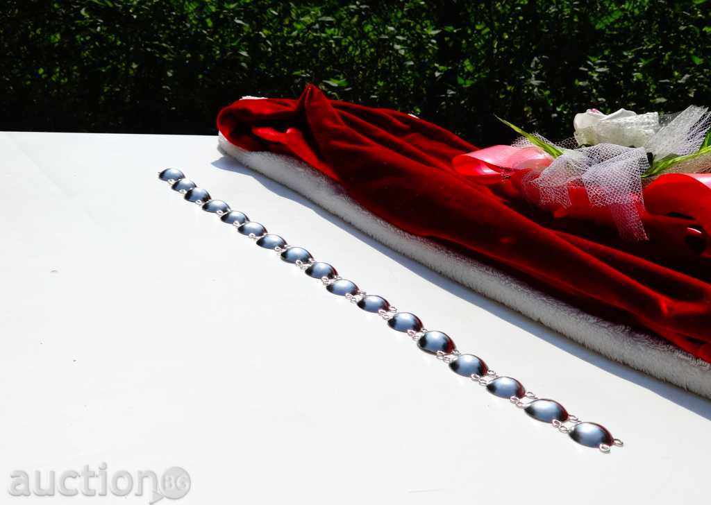 Auction  Silver Spherical Elements.