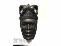 Mask of an African woman, ebony, 22 / 12.5 cm