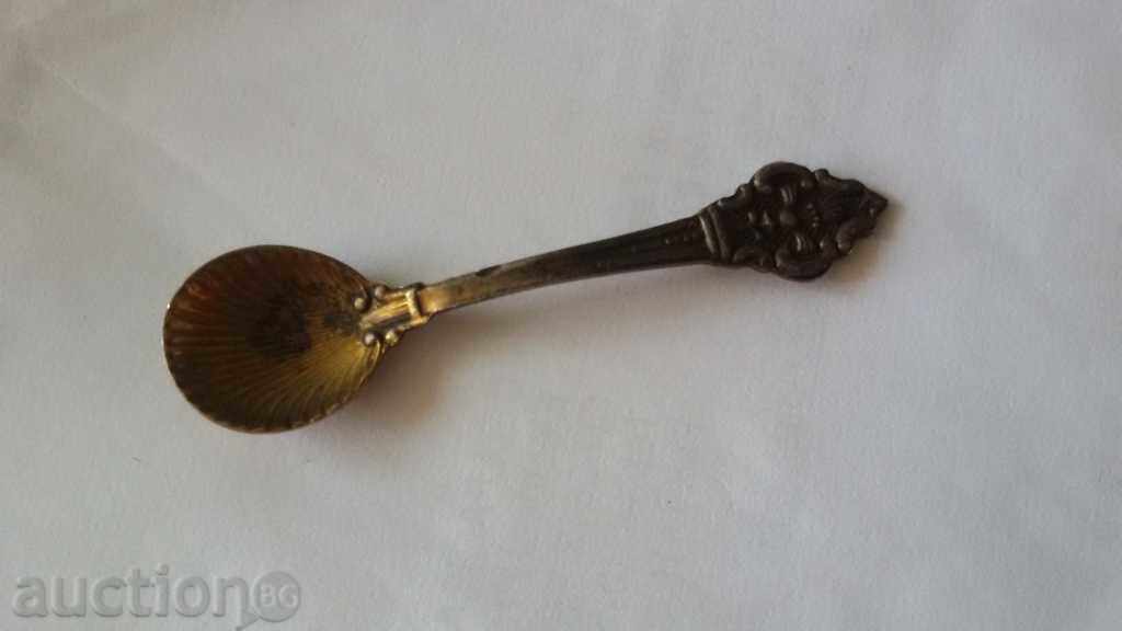 an old, silver-plated silver-plated spoon