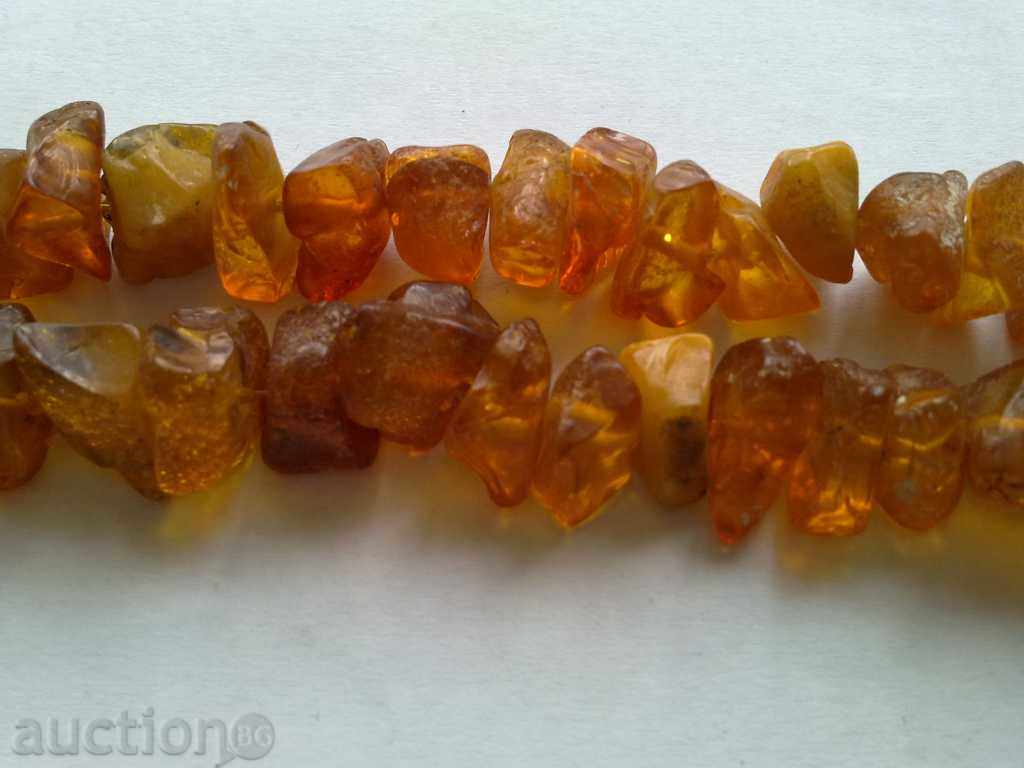 Amber necklace with price 20.00 BGN | € 10.23 Amber necklace with price 20.00 BGN | € 10.23
