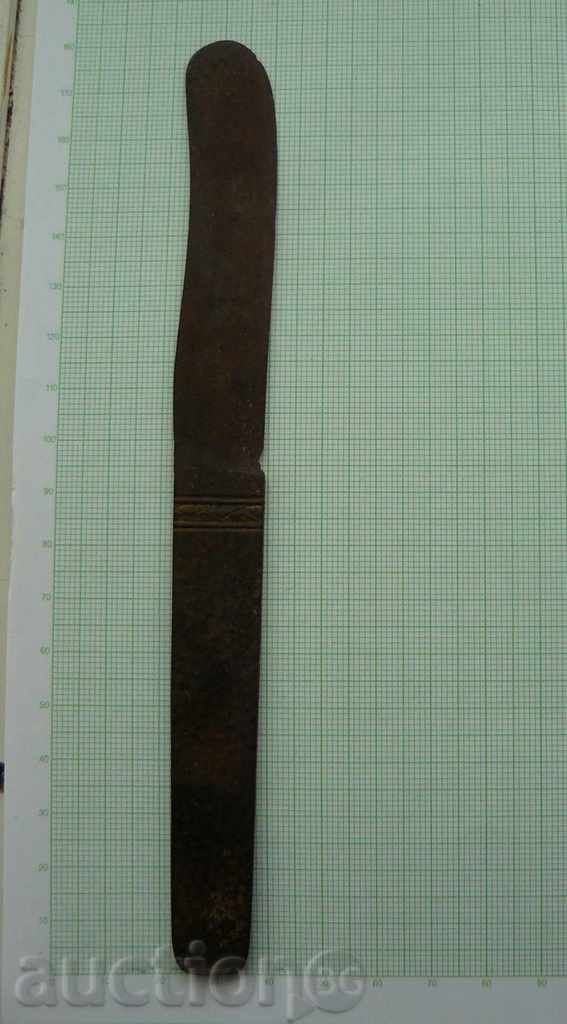Old knife with trident marking