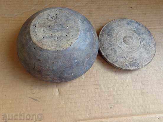 Delivery of An old wooden bowl with a lid, a cop, a wooden one