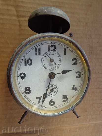Auction  Old German table clock, alarm clock