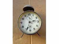 Old German table clock, alarm clock