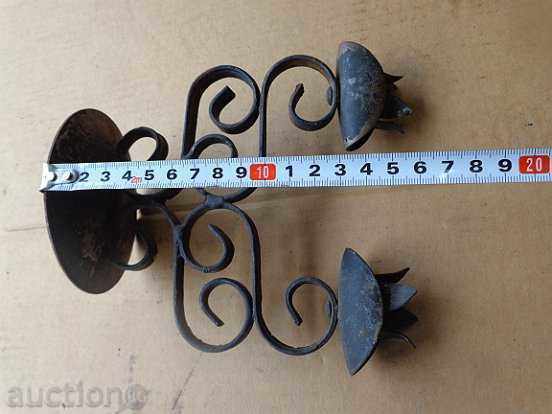 Delivery of An old hand-forged candleholder, lamp, wrought iron, candle Delivery of An old hand-forged candleholder, lamp, wrought iron, candle