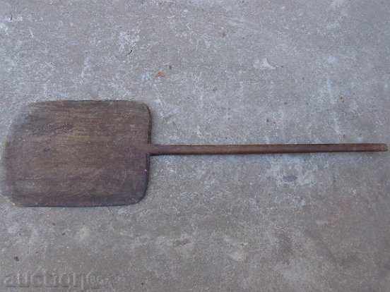 Old wooden big shovel, blade, wood for furnace