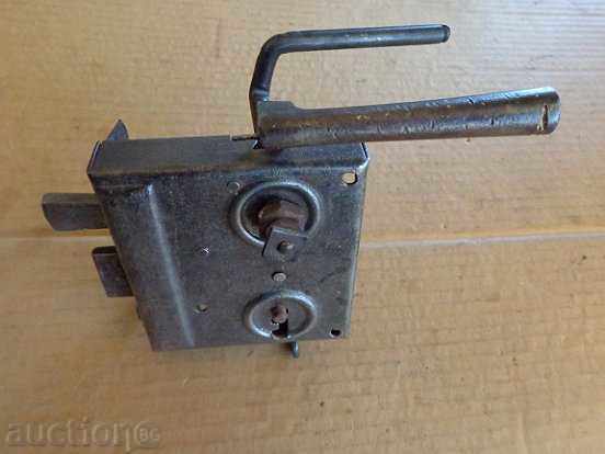 Old lock key, latch - early twentieth century Old lock key, latch - early twentieth century