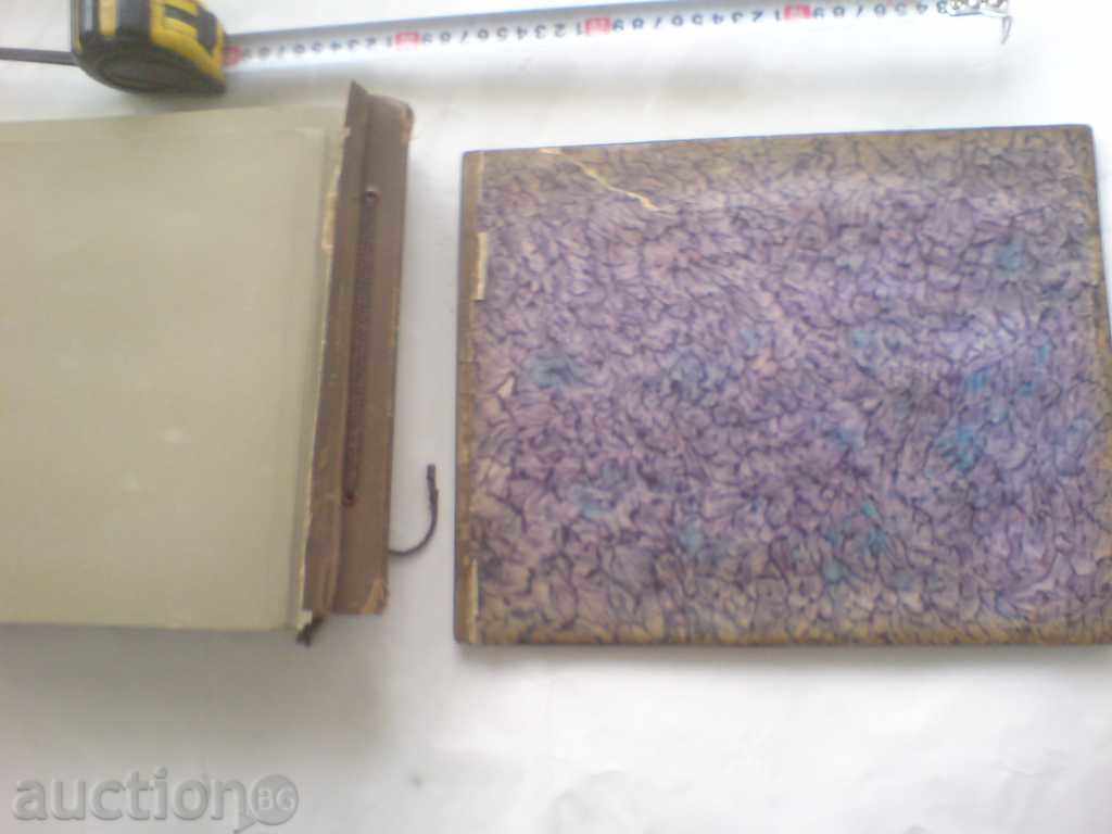 Auction album with wooden covers Auction album with wooden covers