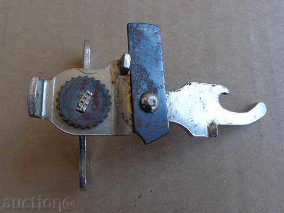 Auction  An old opener for cans, beer, lemonade, oil