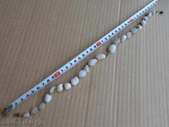 Delivery of An old necklace made of semiprecious stones, a necklace, a jewel, a jewel Delivery of An old necklace made of semiprecious stones, a necklace, a jewel, a jewel