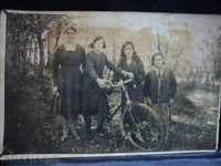 Photo of women with a bicycle