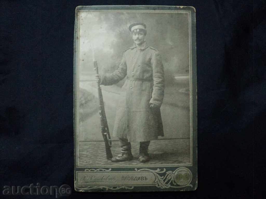 Delivery of Old picture Thick cardboard-Soldier with rifle. Delivery of Old picture Thick cardboard-Soldier with rifle.