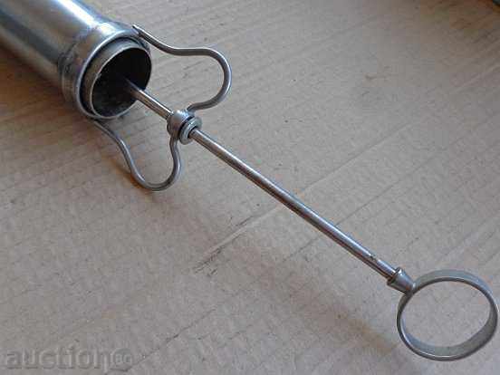 Auction  Old metal syringe, horsepower injection