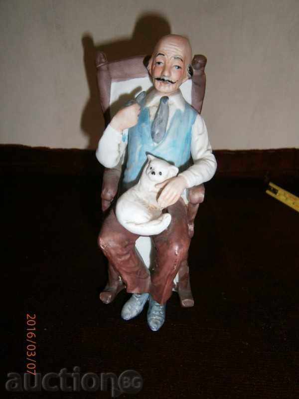 Collectible figurină - Santa într-un balansoar