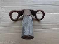 Old waxed wood carved iron