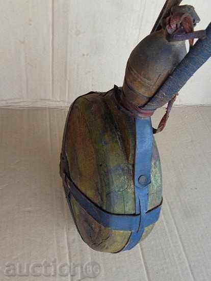 Delivery of An old handmade vase of primitive wooden bucket Delivery of An old handmade vase of primitive wooden bucket