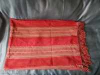 Handwoven bedspread with knitted lace