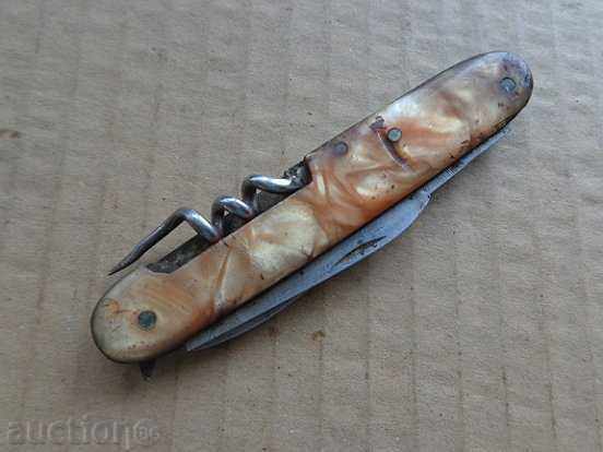 Delivery of Old Soccer knife with sickle and hammer, knife, opener Delivery of Old Soccer knife with sickle and hammer, knife, opener