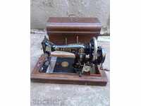 Old manual sewing machine "ANKER", working