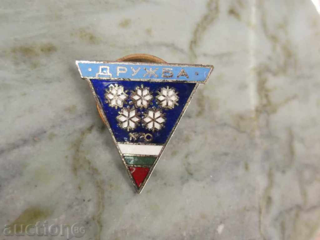 A rare bronze-enamel sign A rare bronze-enamel sign