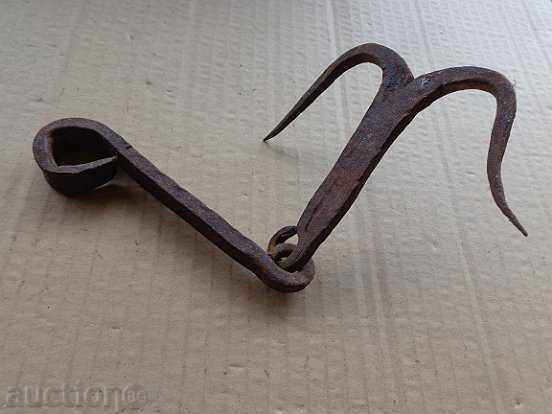 An old forged hook for scraping, a cock, anchor with price 32.00 BGN | € 16.36 An old forged hook for scraping, a cock, anchor with price 32.00 BGN | € 16.36