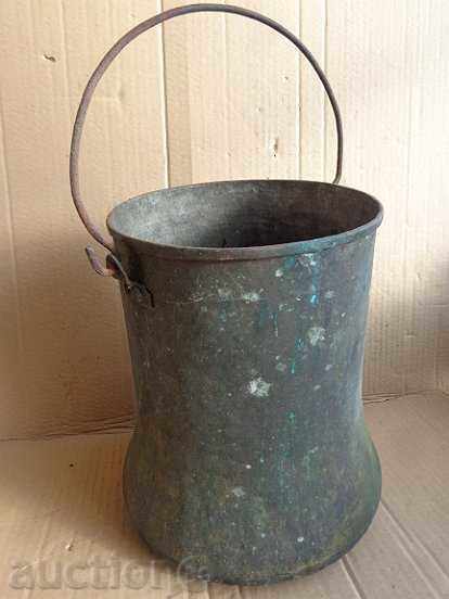 An old cauldron, a baker, a copper pot, a boiler, a bucket, a bucket
