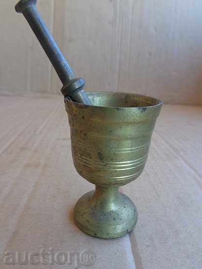 Delivery of Old bronze mortar with a hammer mill