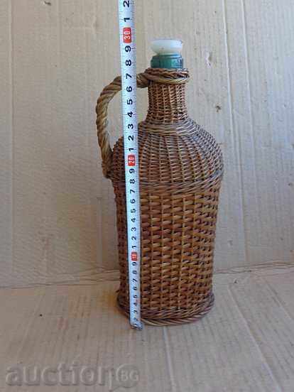 Стара стъклена дамаджана за ракия с оплетка от ракита с цена 39.00 лв. | € 19.94 Стара стъклена дамаджана за ракия с оплетка от ракита с цена 39.00 лв. | € 19.94